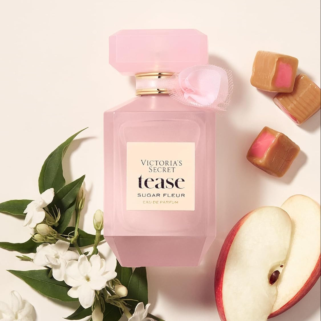 Victoria's Secret Tease Sugar Fleur con manzana, flores y caramelos; textos Manzana fresca, Brotes florales y Caramelo rosa